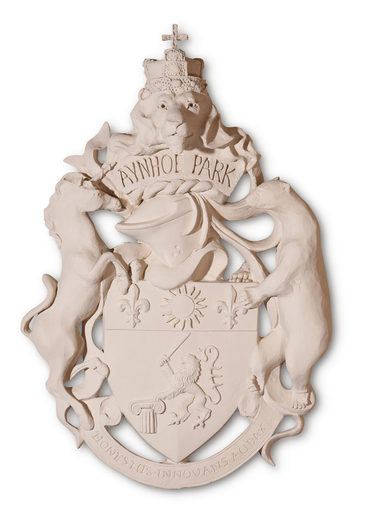 A plaster moulding of the Aynhoe Park Coat of Arms